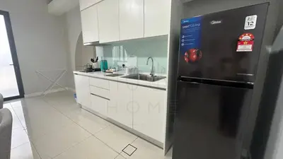 a kitchen with a black refrigerator and white cabinets at Sentral 108 Home Brickfields Bangsar Kuala Lumpur 2-5Pax in Kuala Lumpur