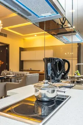 a tray with a tea pot on a table at Dorsett 1 min to TRX Pavilion 127 in Kuala Lumpur