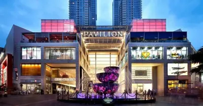 a building with a large purple sculpture in front of it at Kingston Hotel 4 - Hulo Bukit Bintang in Kuala Lumpur