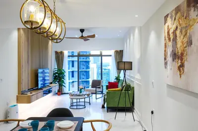 a living room with a couch and a table at Eaton Residence KLCC by GB in Kuala Lumpur