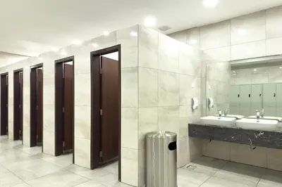 a bathroom with three sinks and two mirrors at Moonway Luxury Suites At TM KLCC City Center in Kuala Lumpur