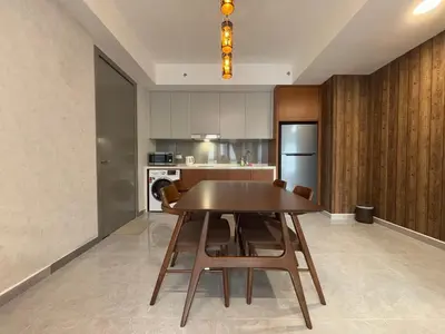 a kitchen with a table and chairs in a room at Agile Bukit Bintang FaceHome, TRX, Pavilion, KL in Kuala Lumpur