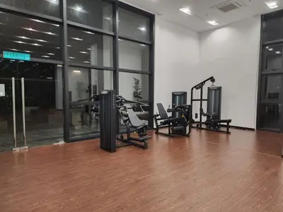 a gym with treadmills and cardio equipment in a building at Chambers Residence Suites Couple Studio in Kuala Lumpur