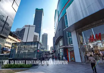 a city street with tall buildings in a city at Fahrenheit Bukit Bintang Big Group 13Pax Family Suites in Kuala Lumpur