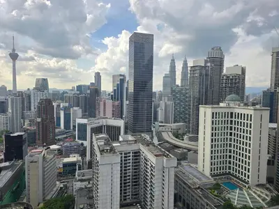 a view of a large city with tall buildings at AXON Residences Kuala Lumpur in Kuala Lumpur