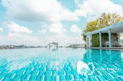 a swimming pool on the water at a hotel at The Signature Serviced Apartment at Sri Hartamas in Kuala Lumpur