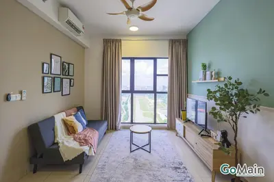 a living room with a couch and a tv at Suitable for Long Stay For 2-4 Trion Bukit Bintang Near KL KLCC in Kuala Lumpur