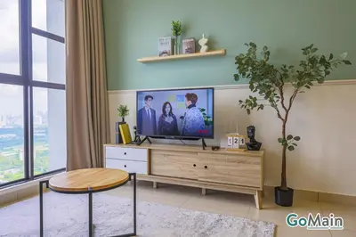 a living room with a flat screen tv on a dresser at Suitable for Long Stay For 2-4 Trion Bukit Bintang Near KL KLCC in Kuala Lumpur