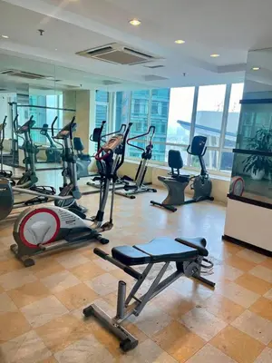 a gym with a bunch of exercise bikes in a room at Parkview KLCC ITSKAYA 21 NEW in Kuala Lumpur