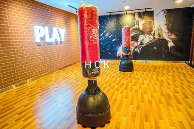 a bowling alley with two vases on the lanes at KL City View at Trion 2 by HCK in Kuala Lumpur