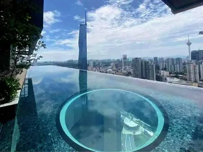 a view of the city from the top of a building at 1BR condo with Amazing KLCC View & Infinity Pool at Lalaport Bukit Bintang in Kuala Lumpur