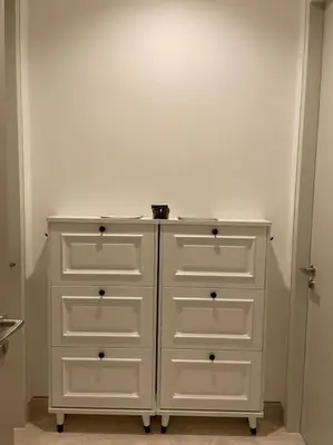 a white chest of drawers in a room at Studio with Amazing KLCC View & Infinity Pool at Lalaport Bukit Bintang in Kuala Lumpur