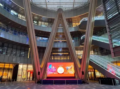 a large building with a stage in front of it at Studio with Amazing KLCC View & Infinity Pool at Lalaport Bukit Bintang in Kuala Lumpur