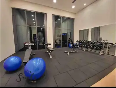 a gym with blue pilates equipment in a room at Lucentia Residence Bukit Bintang by Ideal Homes in Kuala Lumpur
