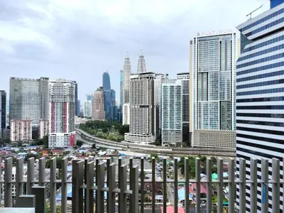 a view of a city skyline with tall buildings at The Luxe Colony KLCC BY Infinitum in Kuala Lumpur