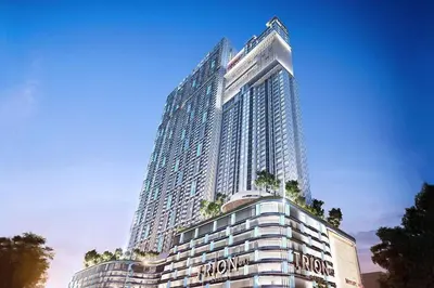 a large building with a sign in front of it at Cozy studio service suite Free parking Netflix Trion B5206 KL in Kuala Lumpur