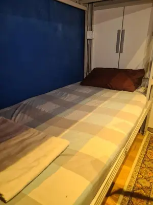 a bed in a room with a mattress at Celestial Heights Hostel featuring Infinity Skypool in Kuala Lumpur