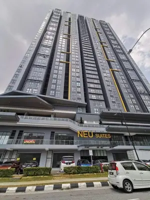 a large building with cars parked in front of it at Rainbowstudioklcc in Kuala Lumpur