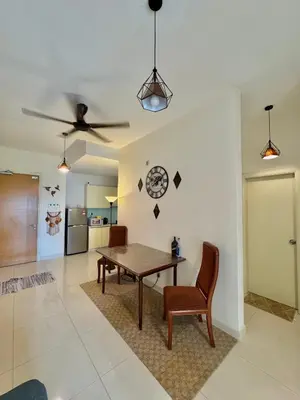 a dining room with a table and a ceiling fan at ABC PRiVATE RooM Klcc in Kuala Lumpur