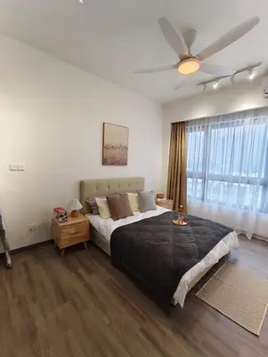 a bedroom with a large bed and a ceiling fan at Agile Bukit Bintang KLCC City Centre Kuala Lumpur Malaysia in Kuala Lumpur