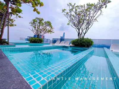 a swimming pool on the roof of a building at KL Eco City Luxury 2 Bedrooms Apartment, Walking Distance to Mid Valley & The Garden & LRT in Kuala Lumpur