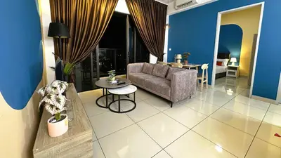 a living room with a couch and a table at KLCC view 1BR service suite with Balcony Trion B5311 KL in Kuala Lumpur