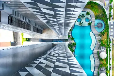 a rendering of the lobby of a building at KL Premium Dual Key Studio with KLCC view on the 56th floor in Kuala Lumpur