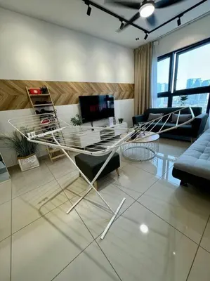 a living room with a couch and a table at PavKlccTrxVelo ,MrtLrt ,13PAX ,4R2B ,Free KLCCPavTRXVelocity X MrtLrt X 13PAX X 4R2B X Free 4CPark in Kuala Lumpur