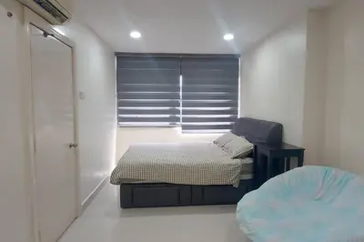 a bedroom with a bed and a window in a room at Fahrenheit 88, Bukit Bintang 10 in Kuala Lumpur