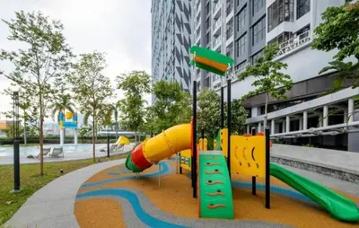 a playground with a slide in a park at TRION KL, KLCC TRX IKEA at Chan Sow Lin, Kuala Lumpur by ONE Guesthouse in Kuala Lumpur