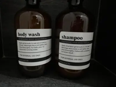 two bottles of soap sitting next to each other at TRION KL, KLCC TRX IKEA at Chan Sow Lin, Kuala Lumpur by ONE Guesthouse in Kuala Lumpur
