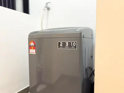 a metal box with a clock on top of it at 5 pax - Bangsar South - 7 mins drive to Mid Valley in Kuala Lumpur
