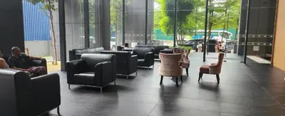 a lobby with couches and chairs in a building at Super suite at Dorsett residence bukit bintang kl in Kuala Lumpur