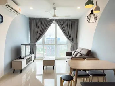 a living room with a couch and a table at 2B2B Cozy - 5 min to PWTC - Sentul KL in Kuala Lumpur