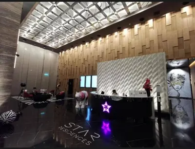 a lobby with a star on the floor of a building at Star KLCC by homestay in Kuala Lumpur