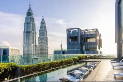 a view of the petronas twin skyscrapers at STAR RESIDENCE KLCC By GANTYA in Kuala Lumpur