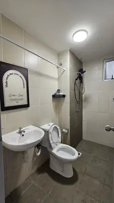 a bathroom with a toilet and a sink at Cozy Homestay KL Setapak 2R2B 1CarPark, Pool, Wifi, MALAYSIAN ONLY & MUS-LIM RECOMMENDED in Kuala Lumpur