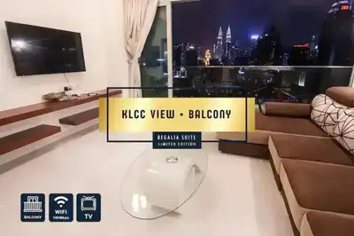 a view of a living room with a large window at Regalia by sweet home in Kuala Lumpur