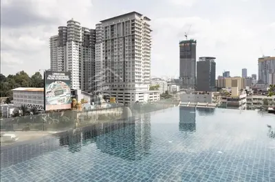 a large swimming pool on the roof of a building at Dua Sentral 2km to KL Sentral in Kuala Lumpur