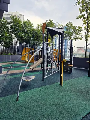 a playground with a slide in a park at Anggun Residence near KLCC Serviced Suite in Kuala Lumpur