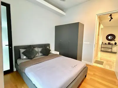 a bedroom with a large bed in a room at KL Sentral 28th Floor CityCenter in Kuala Lumpur