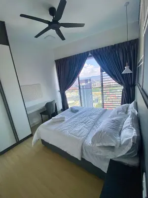 a bedroom with a bed and a ceiling fan at TOP FLOOR 3BR apartment in KL for 6Pax in Kuala Lumpur