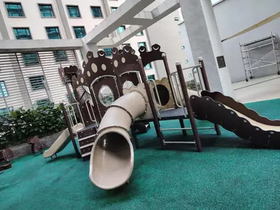 a playground in a building with a slide at Swiss Garden Bukit Bintang in Kuala Lumpur