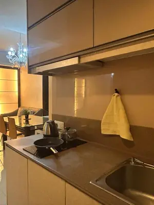 a kitchen with a sink and a counter top at Chelsea Residence Studio, Plaza Damas 3 in Kuala Lumpur