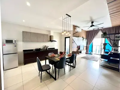 a kitchen and dining room with a table and chairs at Dreamscape By Reizz Residence in Kuala Lumpur