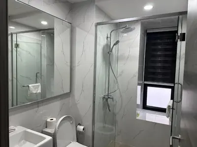 a bathroom with a shower and a toilet and a sink at Agile Residence Bukit Bintang TRX By SweetHome in Kuala Lumpur