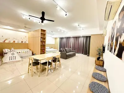 a living room with a table and a couch at Vivo Soho Suite-5pax-Next to Midvalley, KL center in Kuala Lumpur
