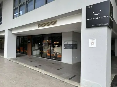 a building with a sign that reads just good coffee at Vivo Soho Suite-5pax-Next to Midvalley, KL center in Kuala Lumpur
