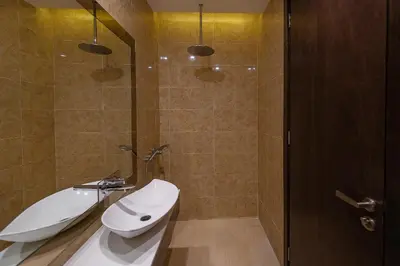 a bathroom with a toilet and a sink and a shower at 1-6pax Dorsett KL 3mins to Pavilion Infinity Pool in Kuala Lumpur