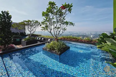a swimming pool on top of a building at Riveria Premium Kuala Lumpur, Roam in Kuala Lumpur